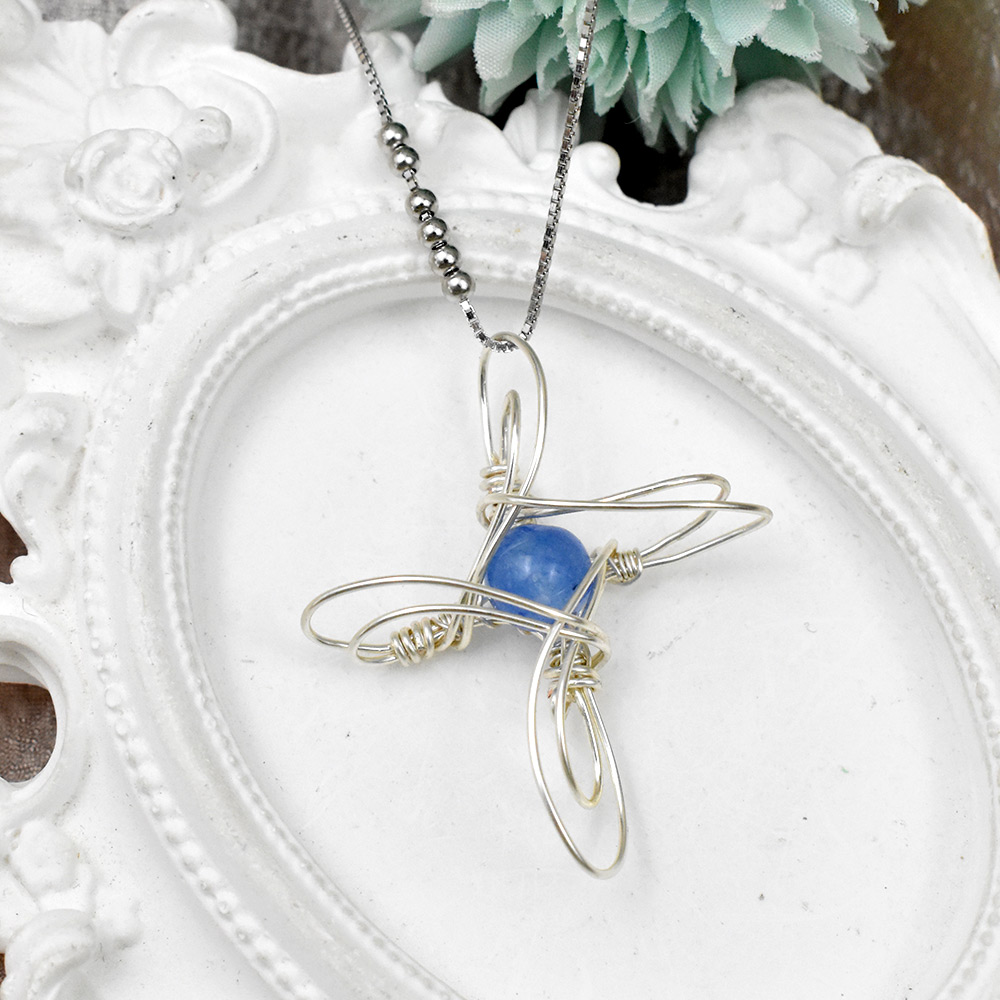 Драгоценный камень в форме звезды, обернутый проволокой-1