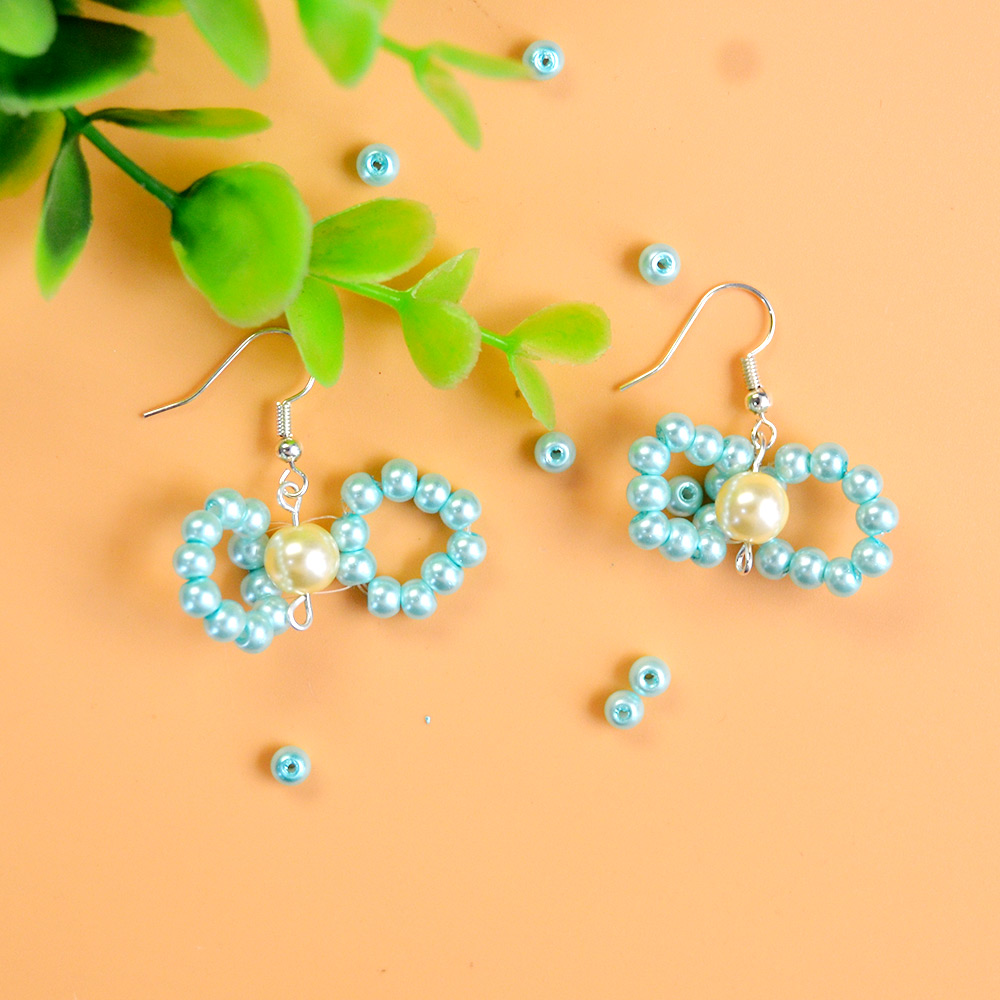 Милые серьги с синим бантом-5