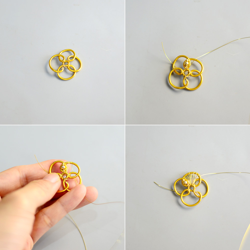 Goldene, mit Draht umwickelte Blumenohrringe