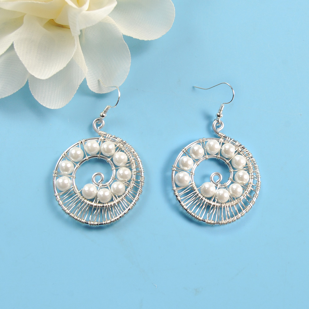 Спиральные серьги с жемчугом-1