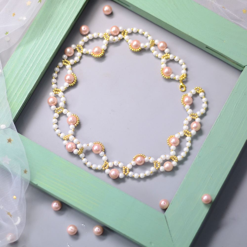 Collar de perlas rosa dulce