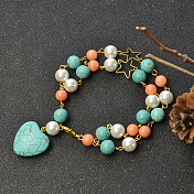 Bracelet et collier en perles turquoise et perles en forme de cœur
