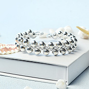 Bracelet tressé en perles d'espacement en argent