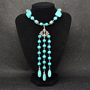 Collier pendentif en perles turquoise de style tibétain