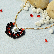 Magnifique collier avec pendentif en perles de verre bicône facettées