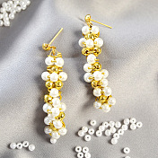 Elegantes pendientes de perlas de alambre