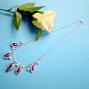 Collier pendentif perle violette