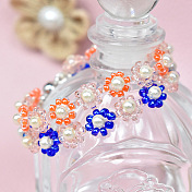 Bracelet à plusieurs niveaux de perles en forme de fleur