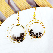 Boucles d'oreilles pendantes avec des perles de pierre gemme