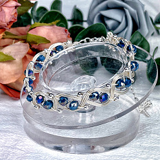 Bracelet tressé en fil de fer avec perles de verre