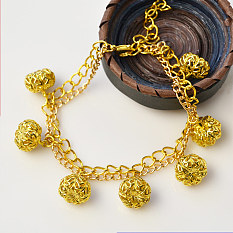Braccialetto pendente con perline in filigrana di zucca dorata