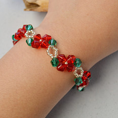 Weihnachtsblumen-Glasperlen-Sticharmband