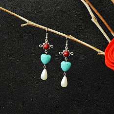 Boucles d'oreilles pendantes en perles turquoise en forme de coeur
