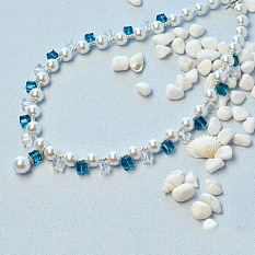 Collier en cristal de perles bleues et blanches