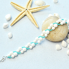 Joli bracelet avec perles en coquillages géants