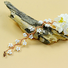 Bracelet enroulé en fleurs de prunier