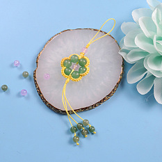 Pendentif fleur tressée en perles de jade