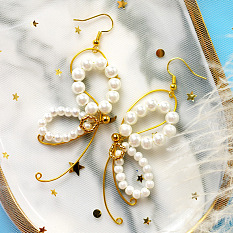 Perlen-elegante Schmetterlingsohrringe