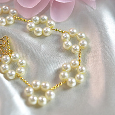 Elegante collar de flores de perlas