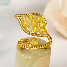 Idée de pandahall sur anneau de remontage perlé