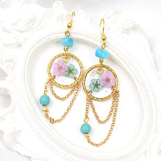 Серьги из смолы в форме цветка 