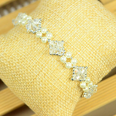 PandaHall Selected idée sur bracelet perle avec perles toupies en verre