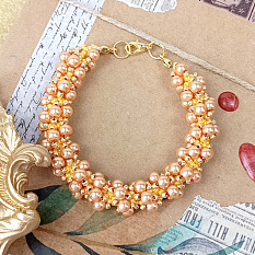 Bracelet spirale en perles dorées