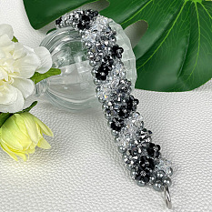 Bracelet gris avec perle de verre et perles toupies