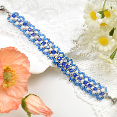 Bracelet en verre bleu et perles de graines