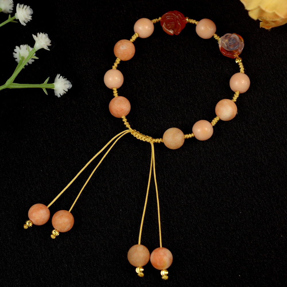 Розовый браслет из плетеной веревки с драгоценными камнями-1