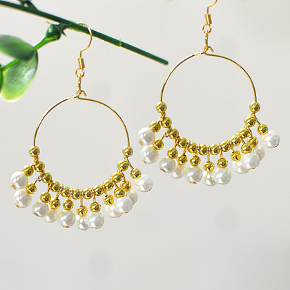 Élégantes boucles d'oreilles créoles en perles d'or-1