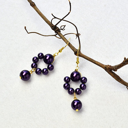 Boucles d'oreilles mystérieuses en perles violettes-1