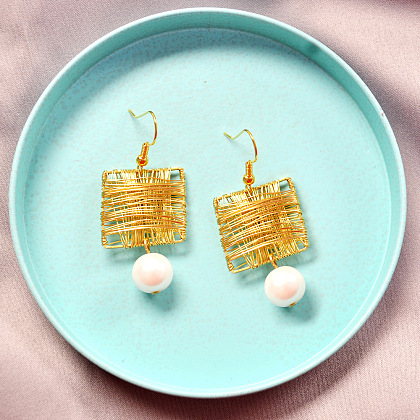 Orecchini di perle in filo dorato-1