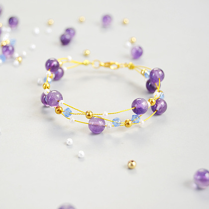 Hübsches Armband mit lila Perlen-1