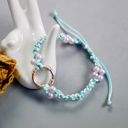 Dunkeltürkises geflochtenes Armband mit Perlen-1