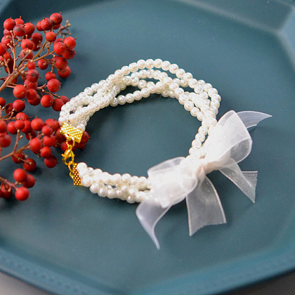 Perlenarmband mit Schleife