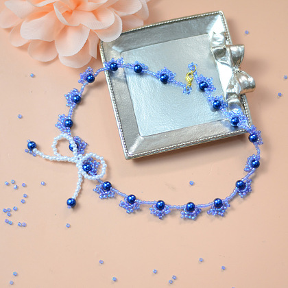 Gargantilla con lazo de perlas azules-8