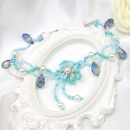 Ожерелье из голубых цветочных семян и жемчуга-6