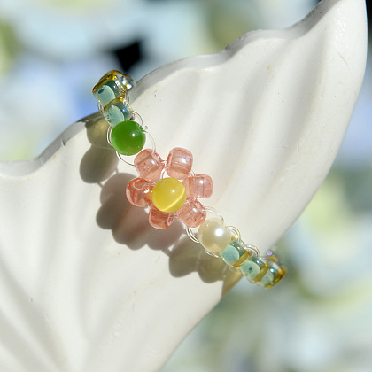 Кольцо из бисера с цветком